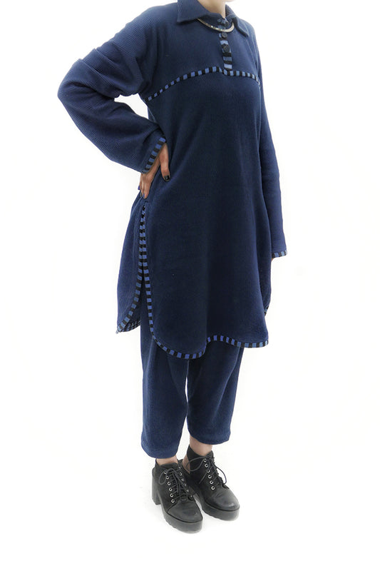 Self textured deep royal blue knit suit.