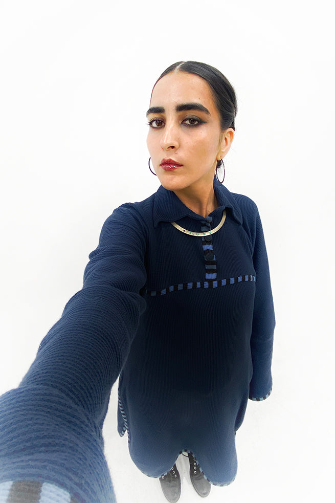 Self textured deep royal blue knit suit.