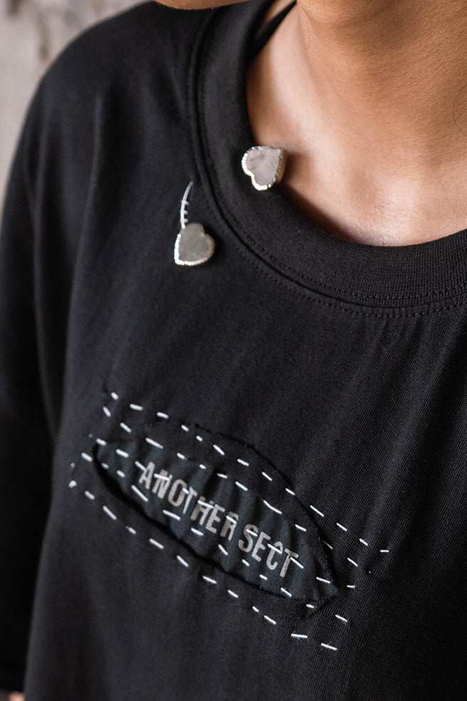 Bracketed hearts t-shirt.